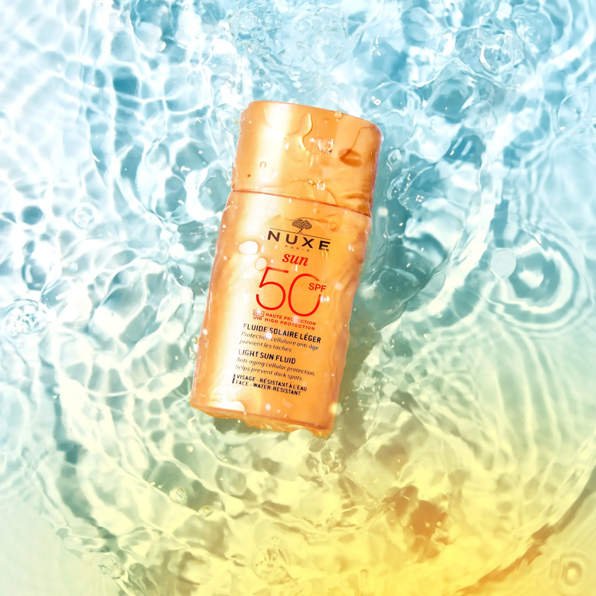 ضد آفتاب فلوئیدی ضد پیری نوکس SPF 50 اصل مناسب پوست نرمال تا مختلط