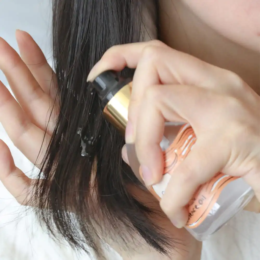 روغن مو الیزاوکا اصل مدل Elizavecca CER 100 Hair Muscle Essence Oil