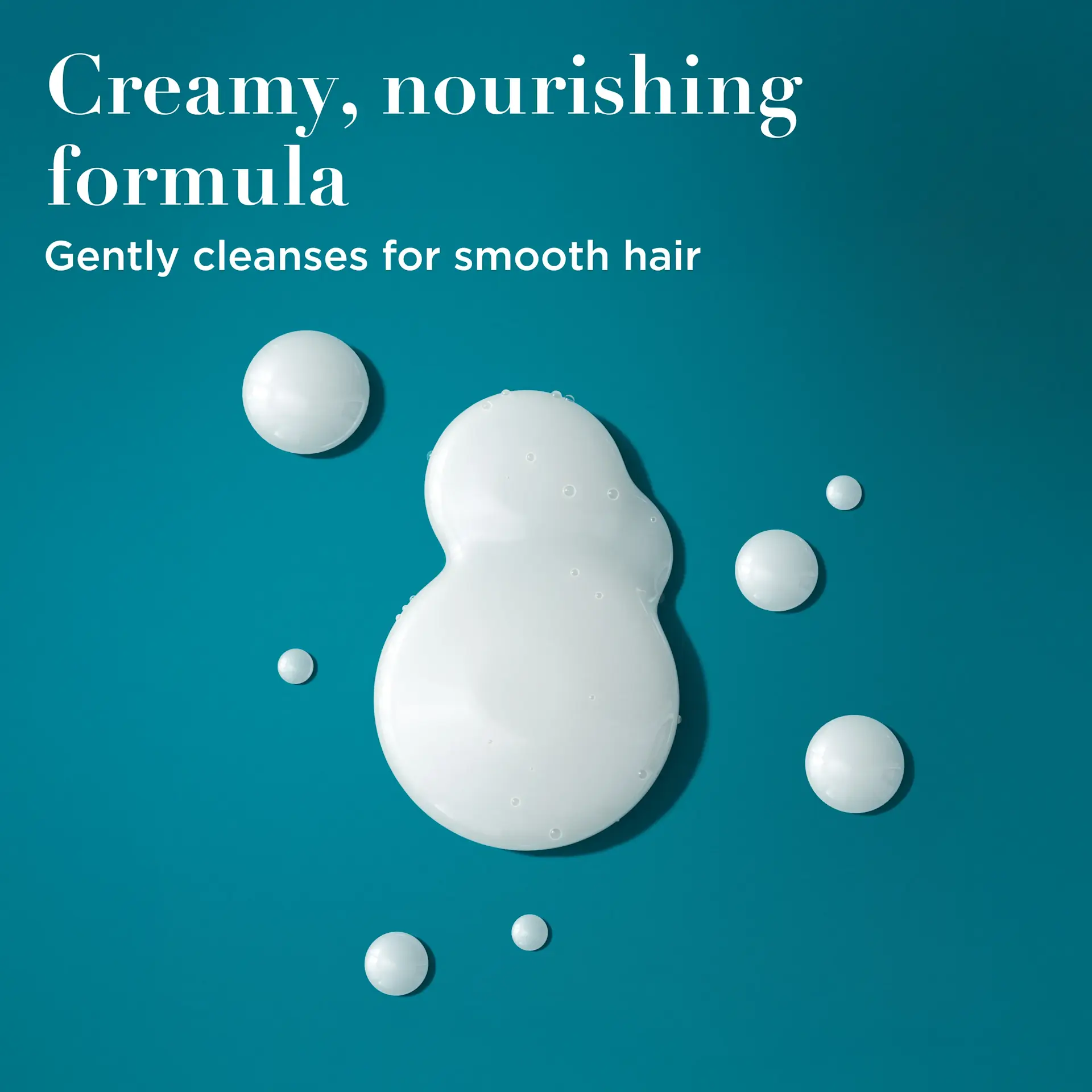 شامپو مغذی شیر نارگیل بدون سولفات او جی ایکس OGX Nourishing Coconut Milk Shampoo برای آبرسانی و ترمیم موهای خشک آسیب‌دیده با فناوری LipiPro Shield