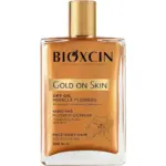 روغن مرطوب کننده و شاین صورت، بدن و مو بیوکسین Bioxcin مدل Gold On Skin اورجینال حجم 100 میل