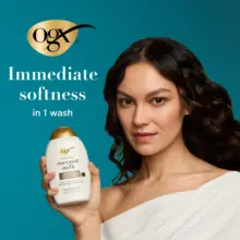 شامپو مغذی شیر نارگیل بدون سولفات او جی ایکس OGX Nourishing Coconut Milk Shampoo برای آبرسانی و ترمیم موهای خشک آسیب‌دیده با فناوری LipiPro Shield