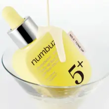ضد آفتاب تون آپ نامبوزین شماره 5 با گلوتاتیون و ویتامین C - SPF50+ PA++++ ضد لک و روشن‌کننده قوی پوست - محصول اصل کره‌ای بدون رد سفیدی