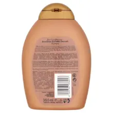 شامپو مراقبت رنگ موی او جی ایکس OGX Fade-Defying Orchid Oil Shampoo حاوی روغن ارکیده و فیلتر UV برای حفظ رنگ، جلوگیری از محو شدگی و آبرسانی موهای رنگ‌شده 385 میلی‌لیتر